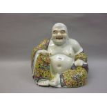 Early 20th Century Chinese porcelain enamel decorated figure of a seated Buddha,