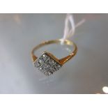 18ct Gold nine stone diamond set ring of square form CONDITION REPORT 2.2g.