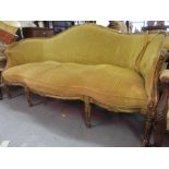 19th Century French giltwood salon sofa with a shaped back and seat,