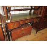 Early 20th Century green leather inset desk having three drawers with brass swan neck handles on