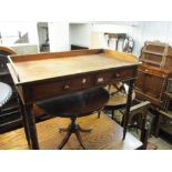 George IV mahogany washstand with a low galleried back above two frieze drawers raised on turned