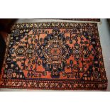 Two 20th Century rugs of medallion design with multiple borders,