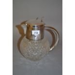 Hobnail cut glass lemonade jug with silver plated mounts and ice compartment