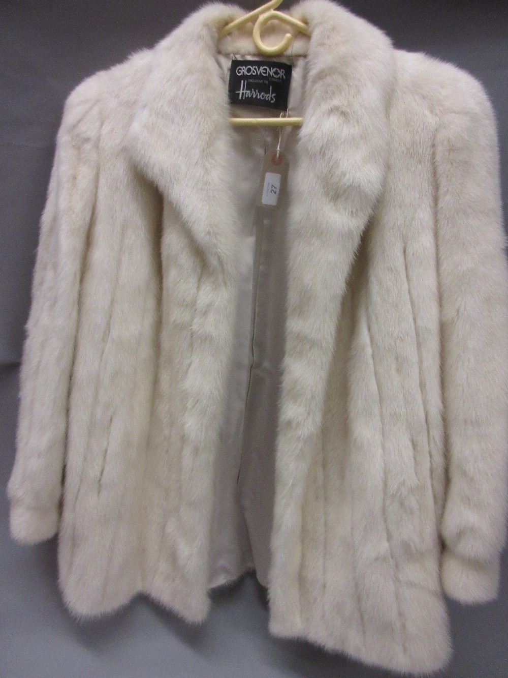 Ladies white fur half length fur coat by Grosvenor exclusive to Harrods,