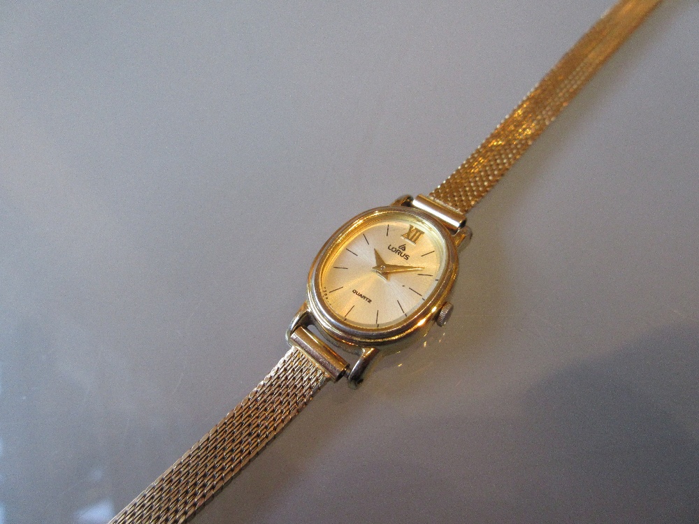 Ladies 18ct gold watch bracelet attached to a modern Lorus gold plated quartz watch