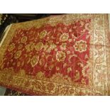 Red ground Ziegler design machine rug, 1.9m x 1.