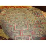 Large Kelim rug decorated with two gols and all-over figures and animals, with multiple borders,