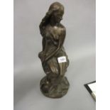 Reproduction bronzed composition figure of a seated figure,