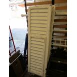 Pair of late 19th / early 20th Century French white painted wooden window shutters