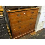 Late Victorian birch chest of two short and three long drawers with brass handles on a plinth base