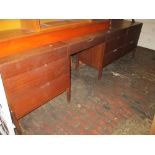 20th Century teak dressing chest and dressing table having nine drawers,