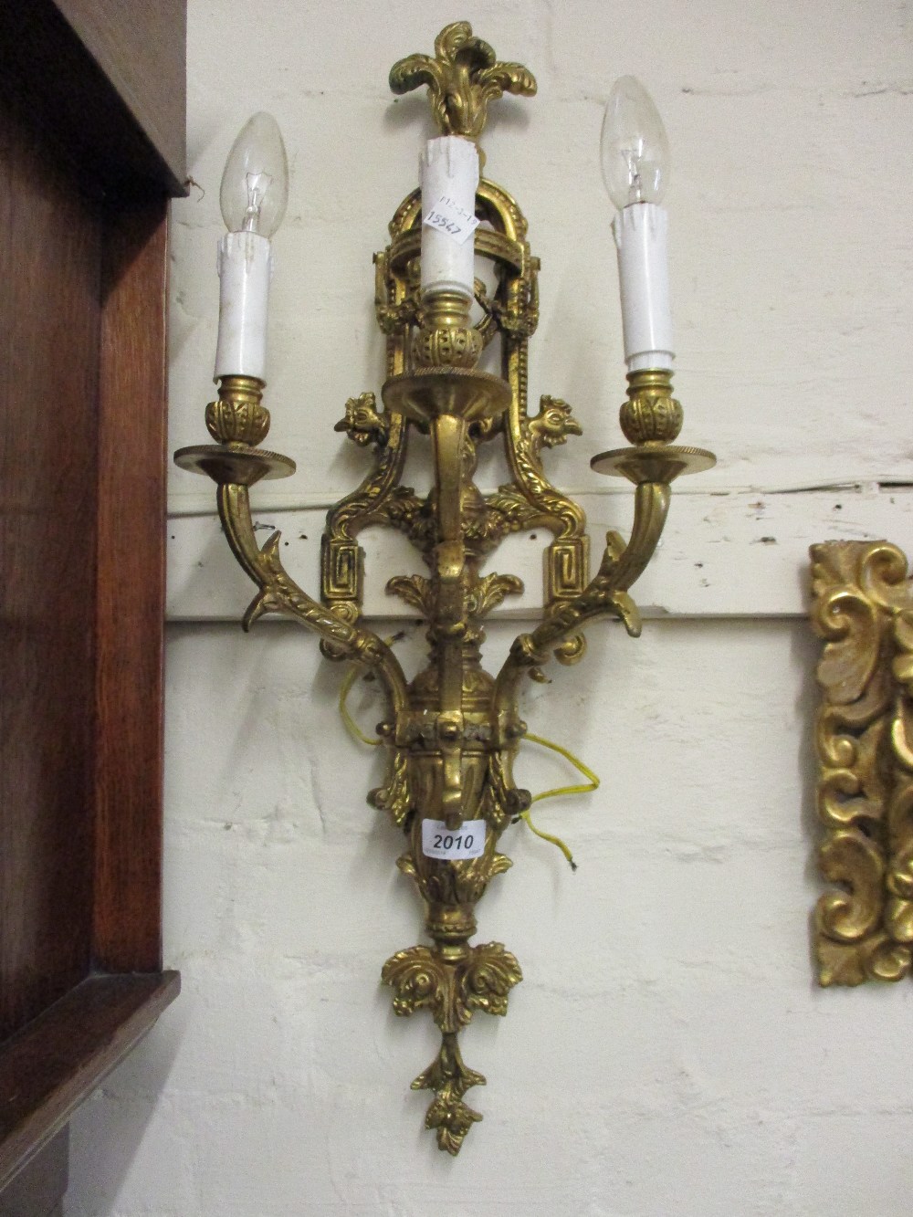 Pair of ornate good quality heavy cast brass three branch wall lights,