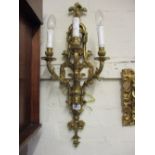 Pair of ornate good quality heavy cast brass three branch wall lights,