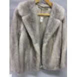 Ladies grey coloured half length fur coat and a mink fur stole CONDITION REPORT