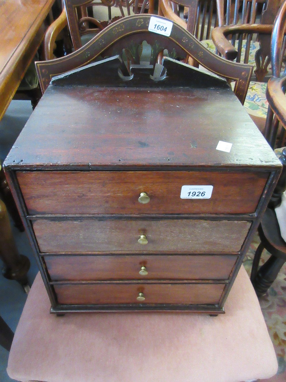 19th Century mahogany table top chest of four drawers with brass knob handles,