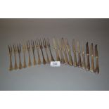 Near set of Christofle silver plated dessert knives and forks (nine forks,