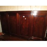 20th Century mahogany breakfront sideboard having four panelled doors,