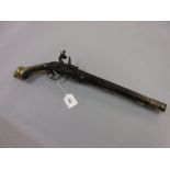Antique flintlock pistol with brass mounts,