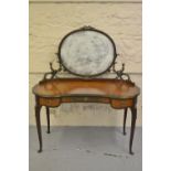 Early 20th Century French amboyna and ormolu mounted kidney shaped dressing table,