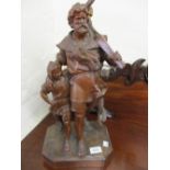 Black Forest carved figural group of father and son,