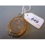 Early Victorian oval gilt metal pendant locket inset with a double sided portrait,
