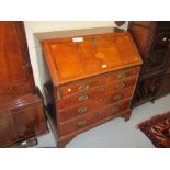 George III mahogany satinwood crossbanded and shell inlaid bureau,