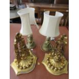 Pair of 19th Century carved and gilded wall brackets together with a pair of similar smaller table