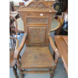 19th Century carved oak open elbow chair,