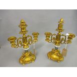 Pair of 19th Century French ormolu and porcelain three branch candelabra