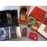 Boxed gold plated Dupont lighter, unboxed Dupont lighter, boxed Yves St.