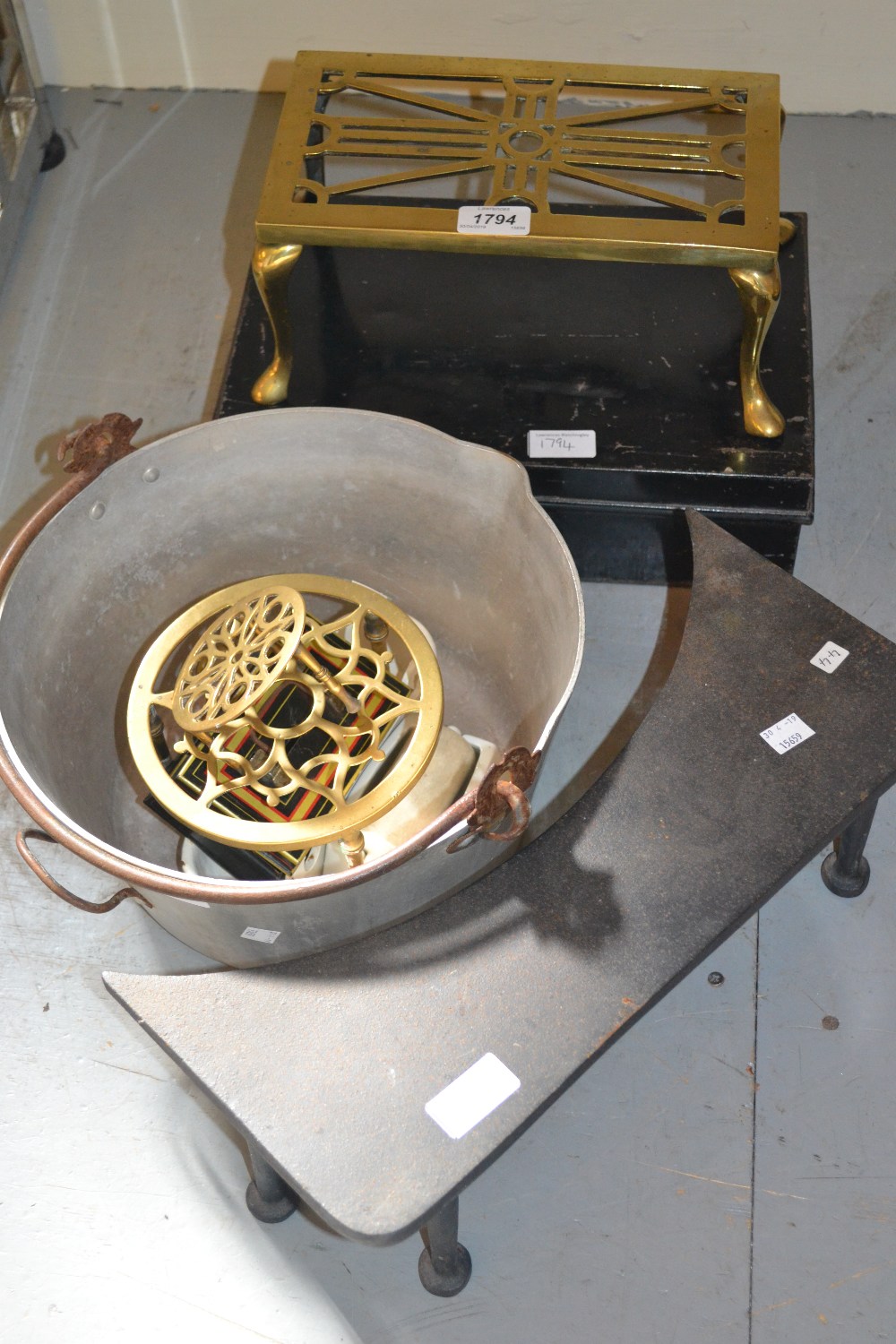 Rectangular brass trivit, circular trivit, iron trivit, aluminium preserve pan, two cash boxes etc.
