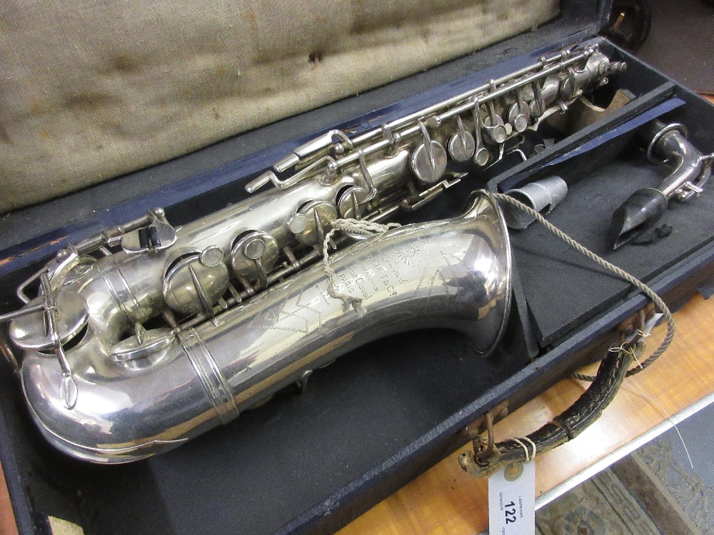 Silver plated saxophone inscribed to the bell Rene Guenot, A Douchet