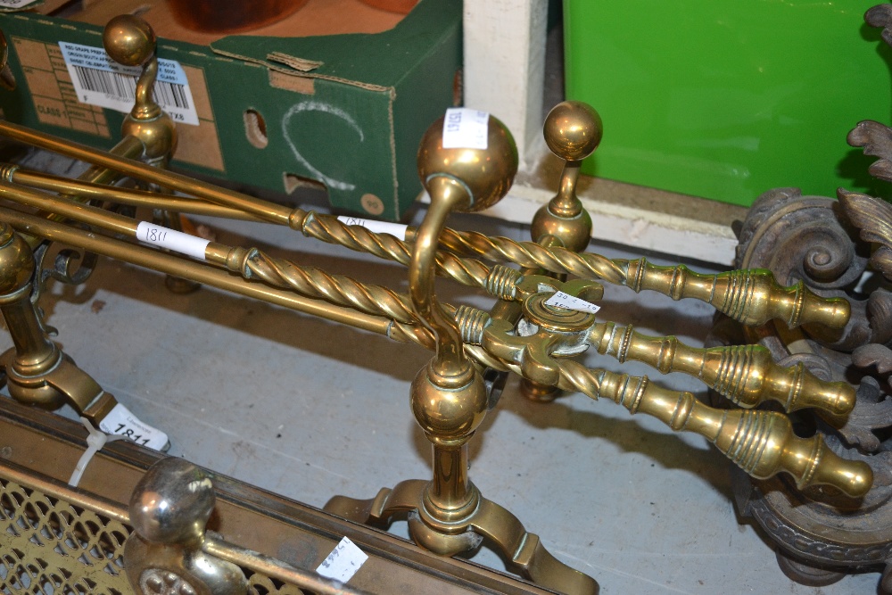 Set of three brass fire irons, pair of brass fire dogs and a modern folding spark guard