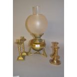 Brass oil lamp together with two pairs of brass candlesticks