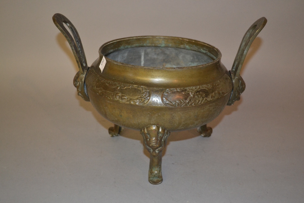 Oriental patinated bronze two handled incense burner, raised on mask head supports - Image 4 of 4
