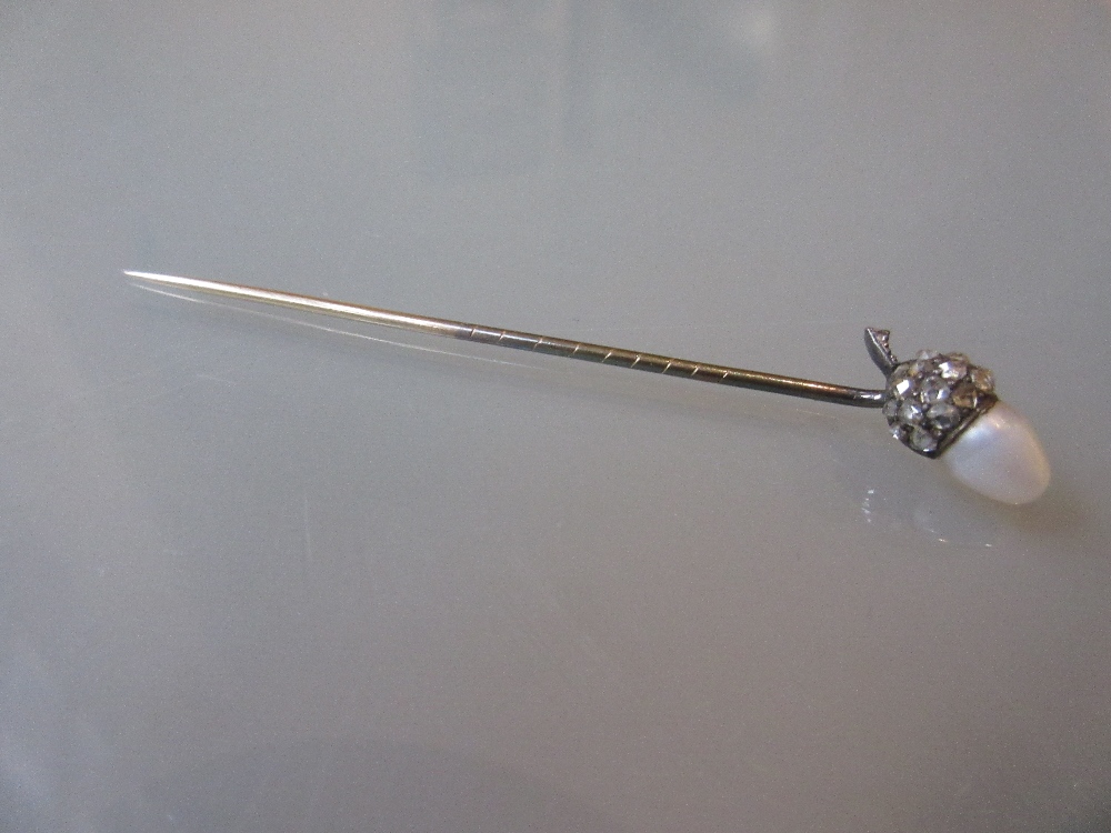 Antique stick pin, the head in the form of an acorn, mounted with diamonds and a cultured pearl
