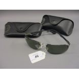 Pair of Ray-Ban sunglasses with case and another case
