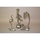 W.M.F. figural candle holder together with a French spelter figural table lamp and a brass figure of