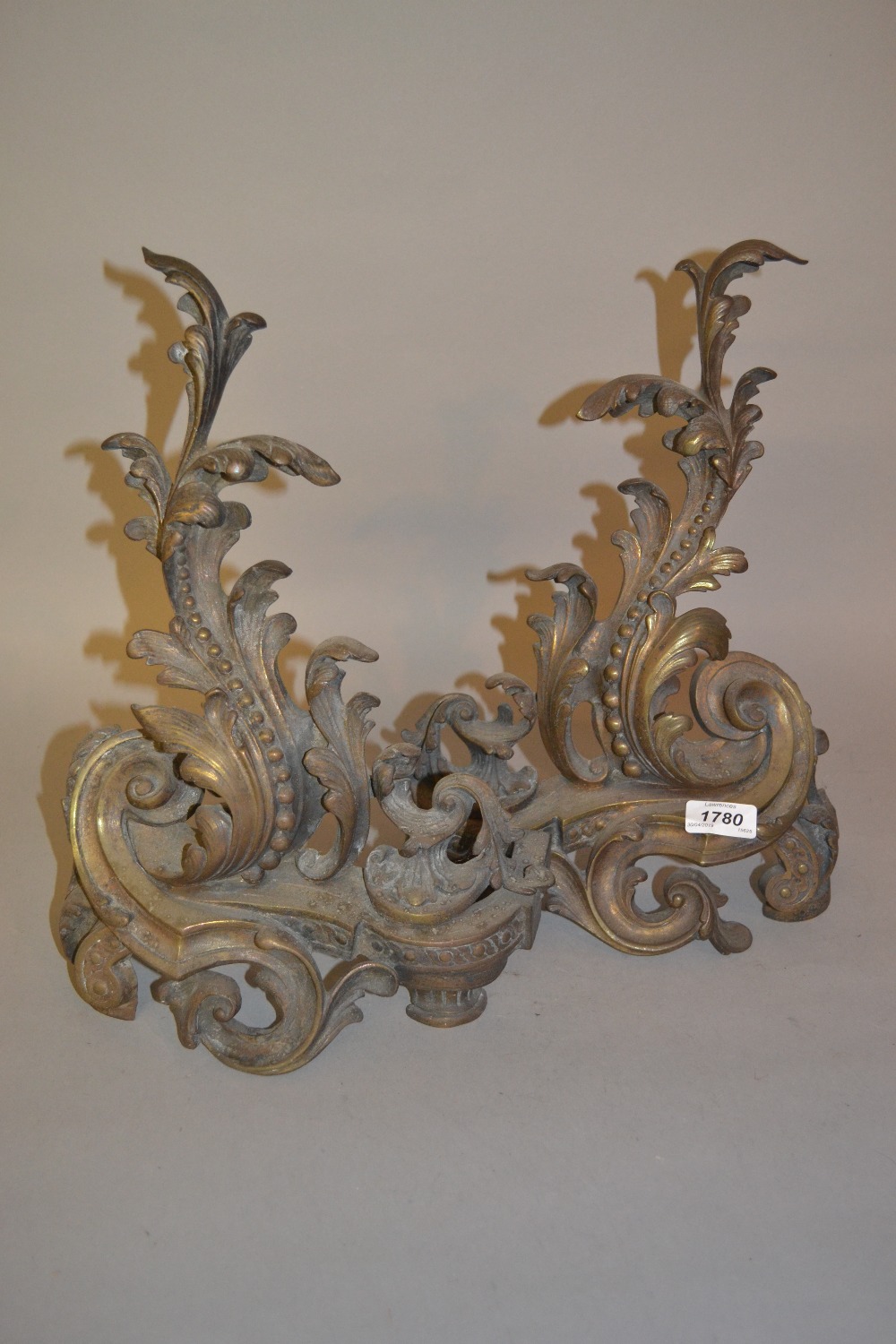 Pair of 19th Century brass rococo design fire dogs