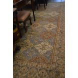 Indian woollen Persian pattern carpet of all-over floral design with multiple borders on a blue