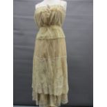 An Edwardian petticoat and skirt, together with a quantity of various mainly mid 20th Century ladies