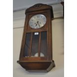 1920's Oak cased two train wall clock, the dial inscribed Camerer Cuss and Co., 186 Uxbridge Road,