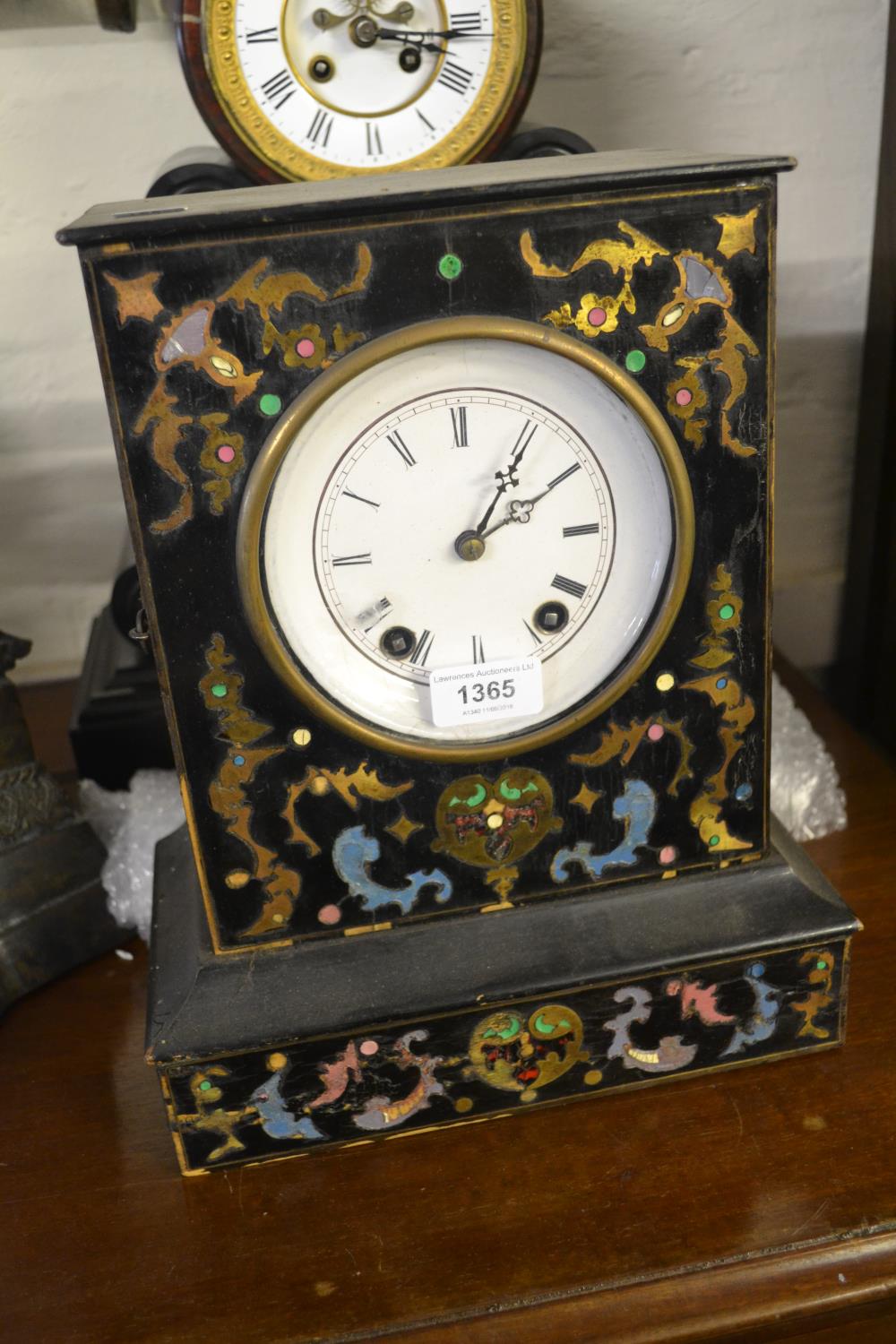 19th Century Continental buhl inlaid mantel clock, the ebonised case enclosing an enamel dial with