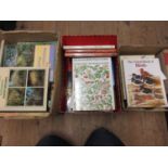 Three boxes containing a collection of gardening and bird related books