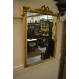 Rectangular gilt framed wall mirror with bow surmount