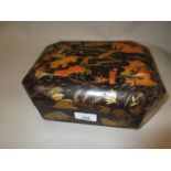 19th Century black cloisonne octagonal work box, the hinged cover enclosing a fitted interior with