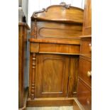 Small Victorian mahogany serpentine fronted chiffonier with a shelf back and two panelled doors,