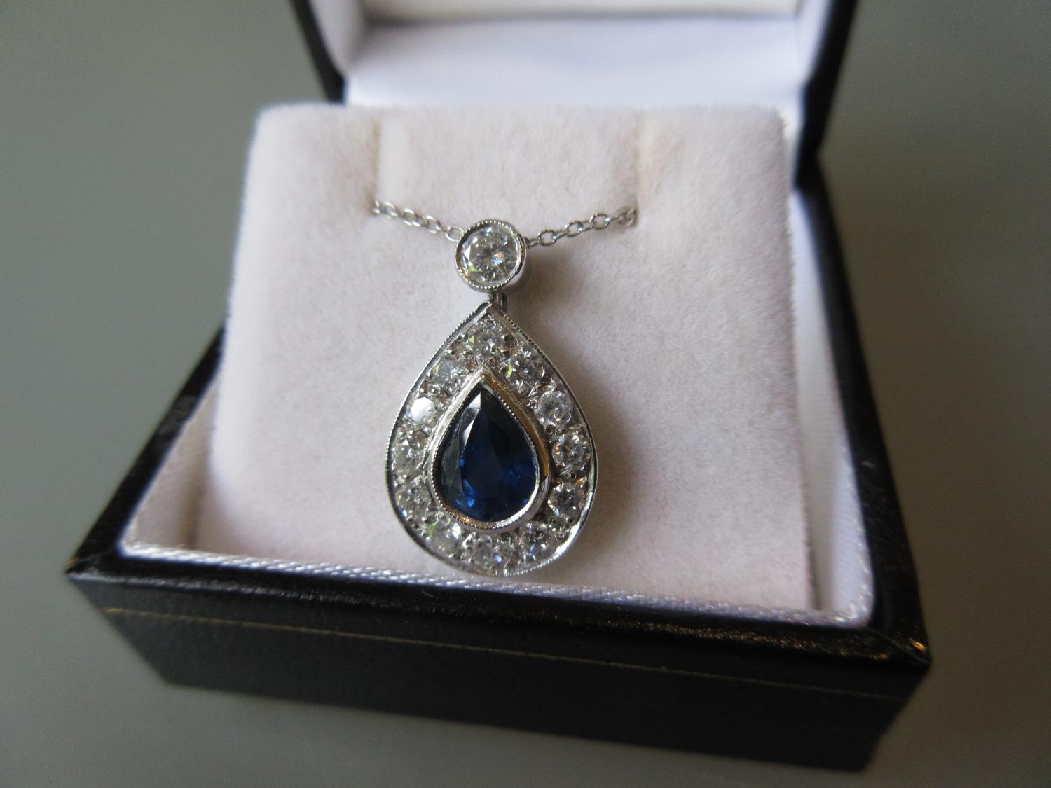 Good quality modern sapphire and diamond tear drop pendant on an 18ct white gold chain, the