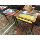 Pair of mahogany table top display cabinets with keys on narrow tapering supports