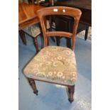 Set of six Victorian mahogany dining chairs, the moulded rail backs, above overstuffed seats and